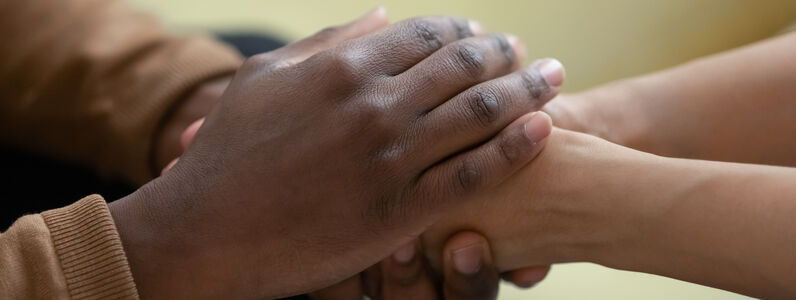 Close,Up,African,American,Man,Hands,Holding,Upset,Depressed,Woman,